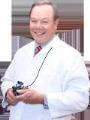 Dr. Gustavo Aranguren, DDS
