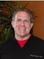Dr. Lowell Whitlock, DDS